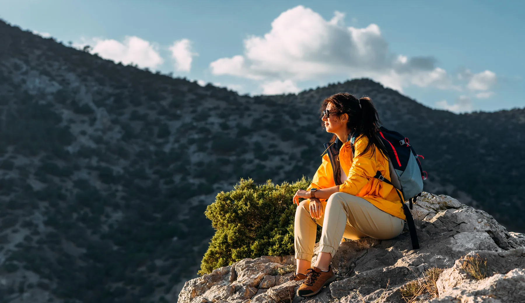 portrait-of-a-female-traveler-in-the-mountains-ad-2025-01-08-23-14-59-utc2.webp